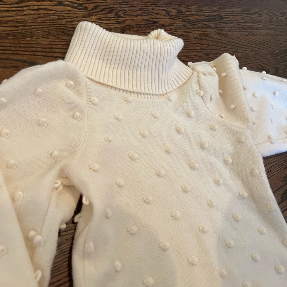 Cream turtleneck from English Factory in excellent condition